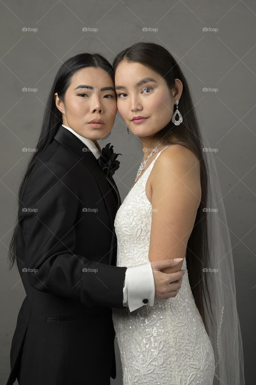 Love is love, Asian bride and groom