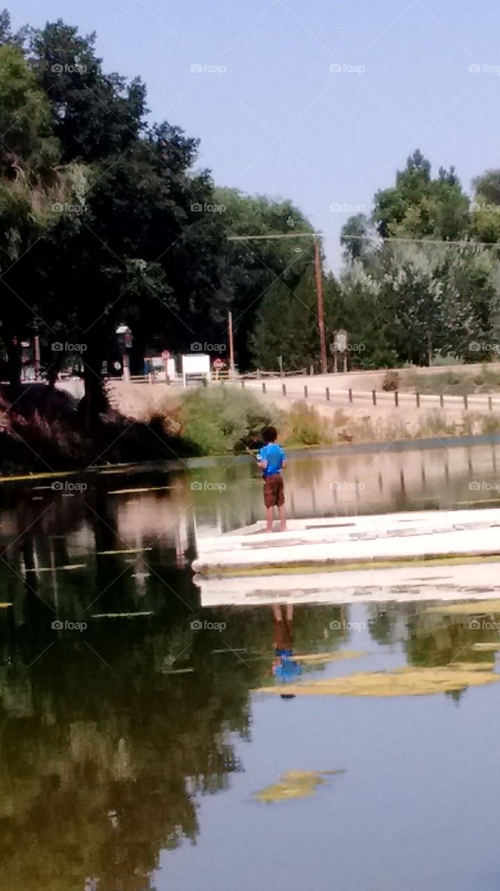 little boy fishing