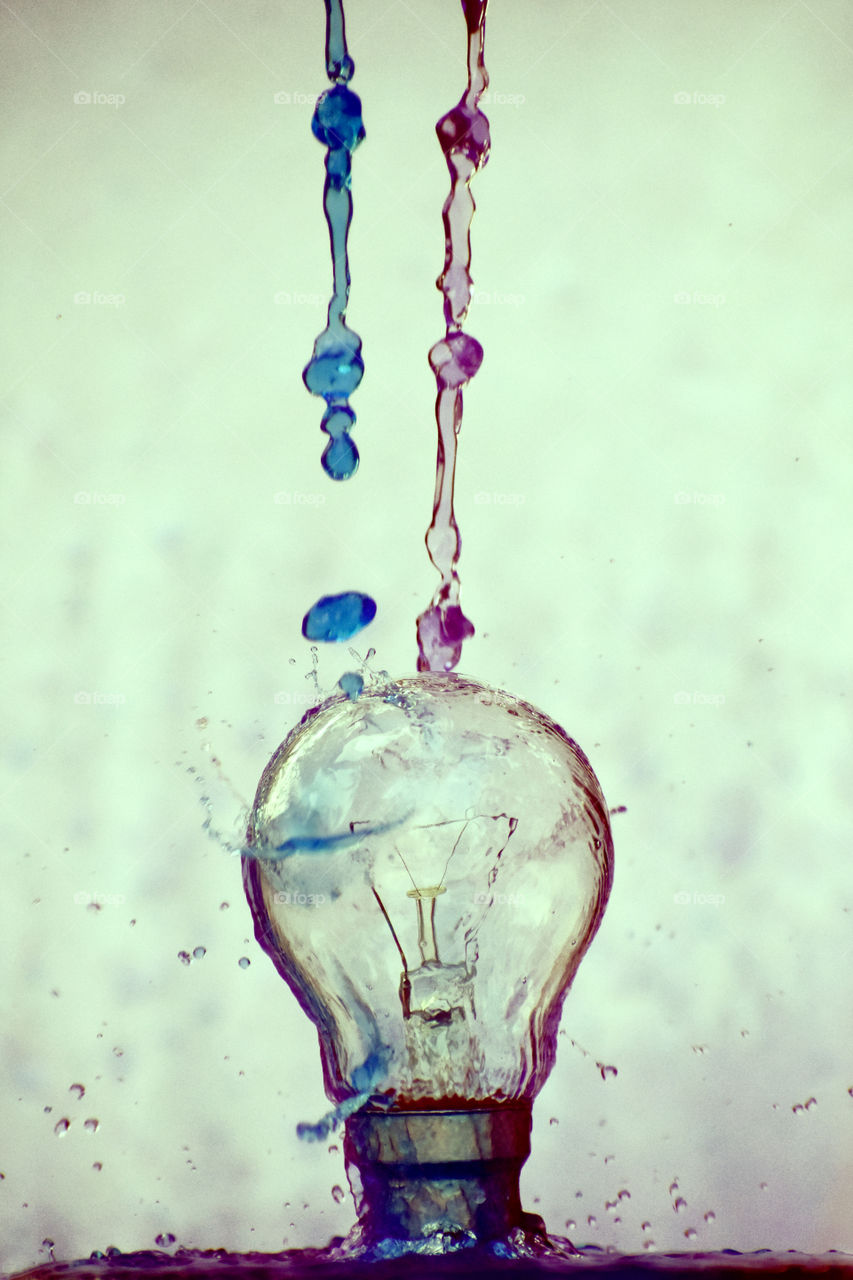 bulb picture for all use .bulb with water splash . colours .water colours