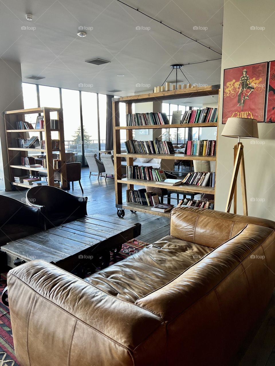 Interior of cafe restaurant with bookshelves