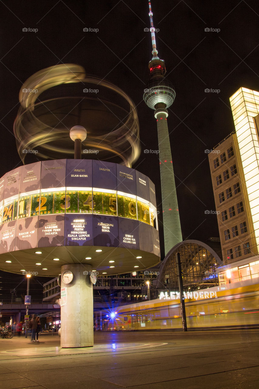 world clock at alexandeplatz in berlin at night
