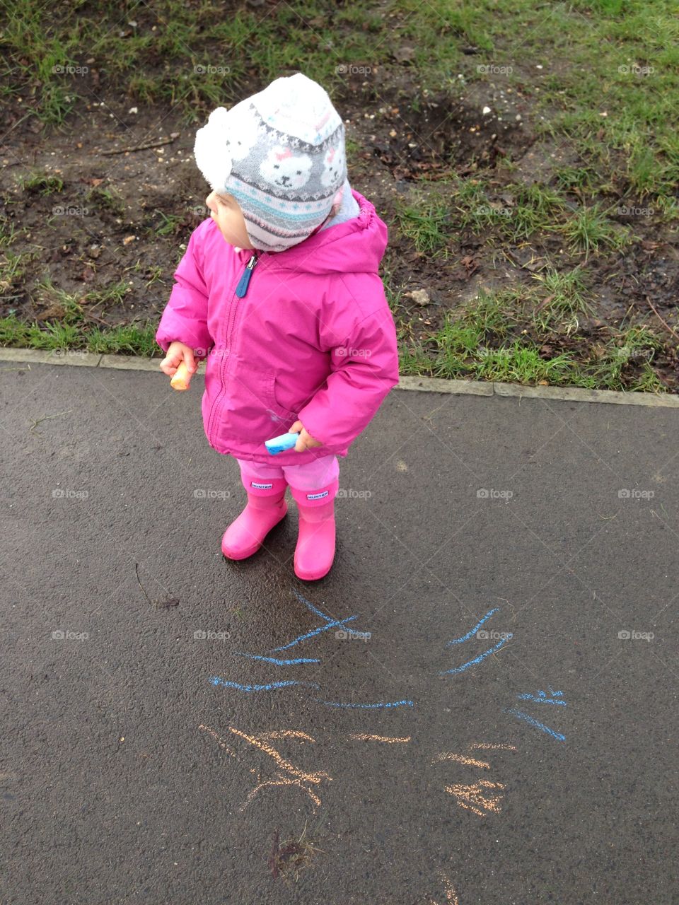 Baby playing with chalk