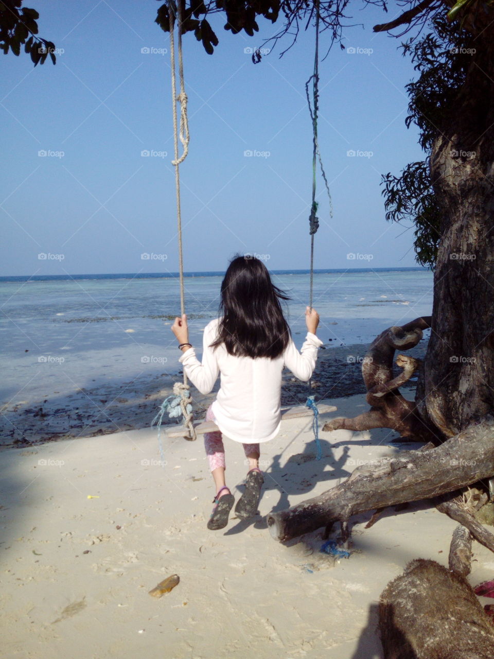 Girl on a swin