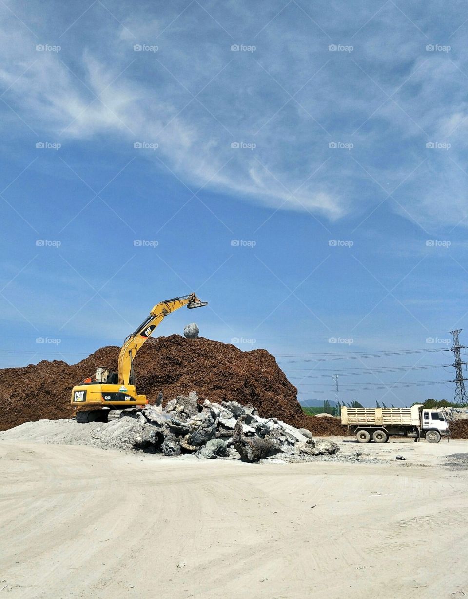 Backhoe is making Steel break.