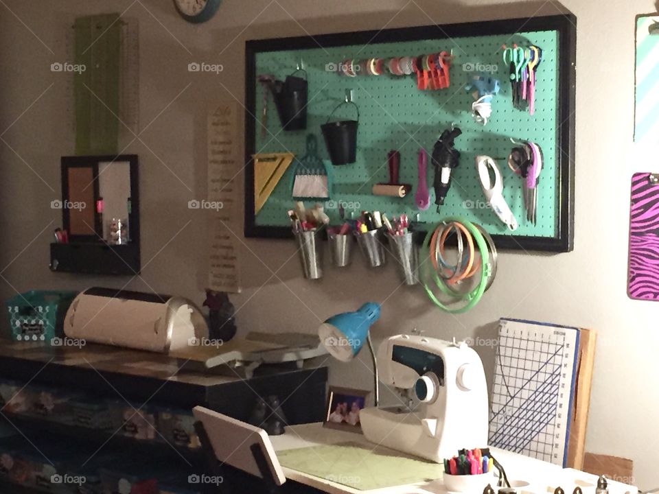 Craft Room Set Up With A Seeing Table and Pegboard 