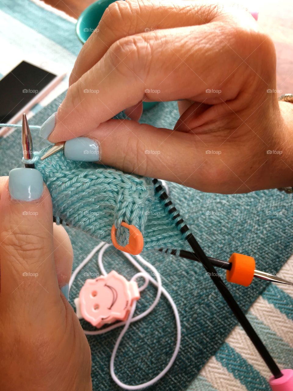 Close up of hands knitting