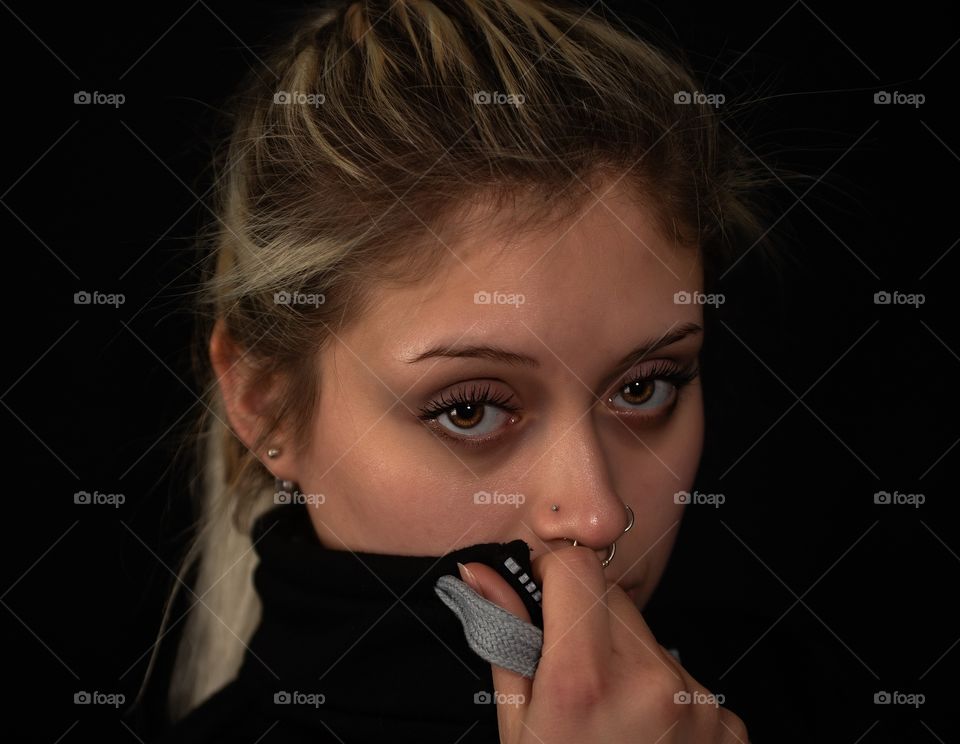 young woman looking at the camera