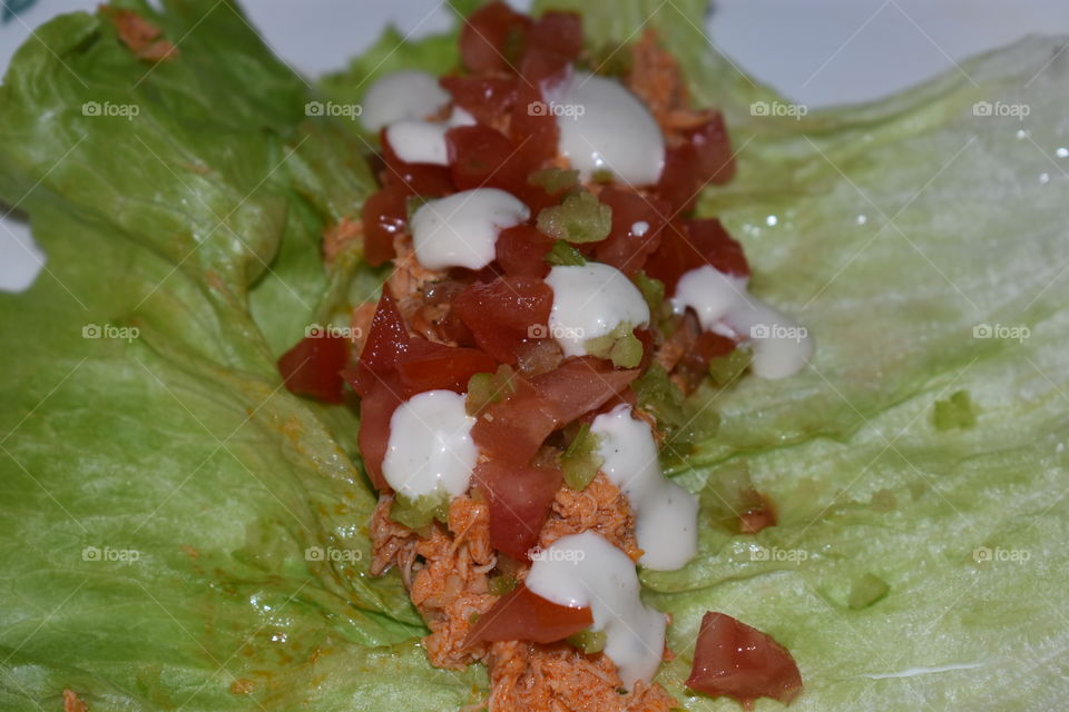 Homemade buffalo chicken lettuce wrap.