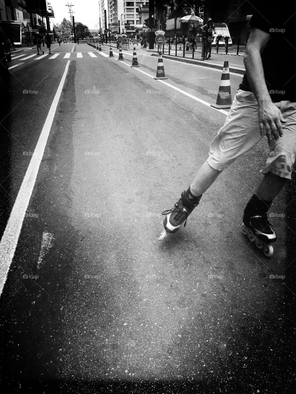 Man with roller skates on the street