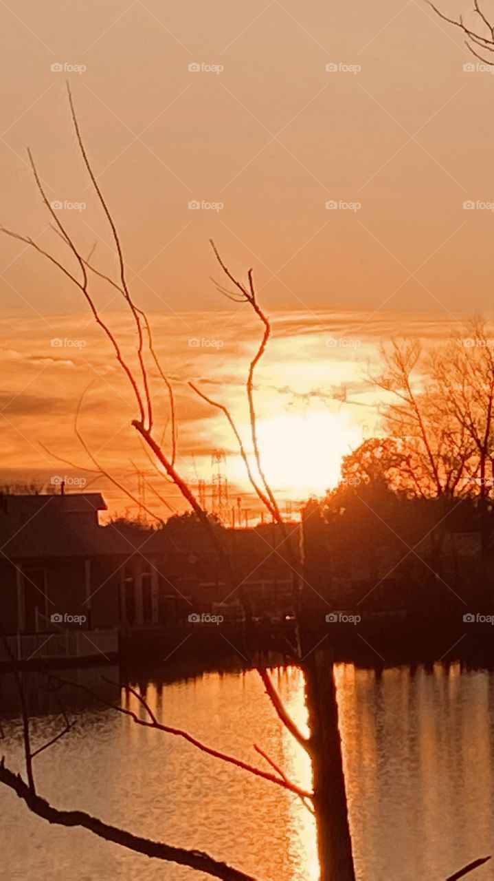Sunsetting With Horizon Clouds Splitting 