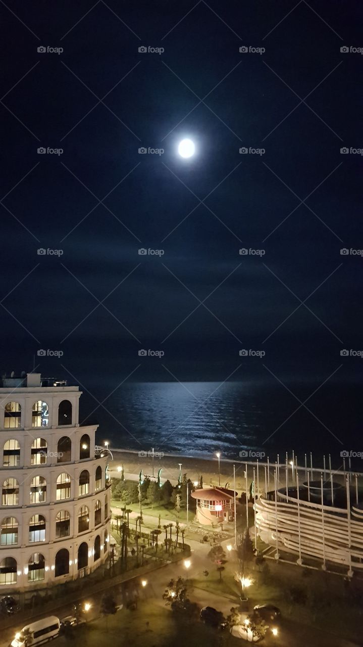 full moon, sea, city