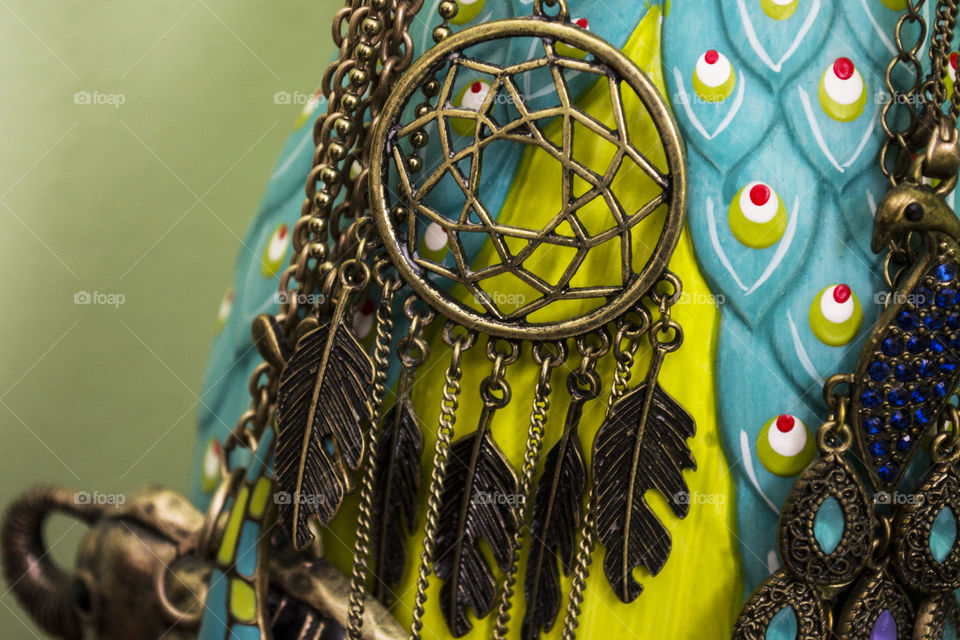 Close-up of a dream catcher necklace