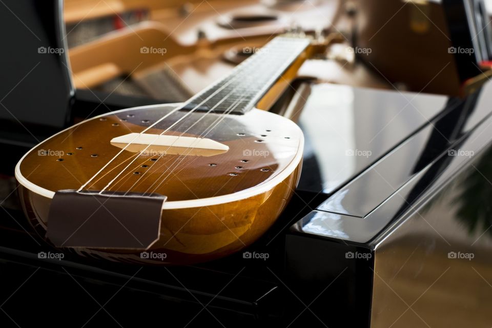 etno tamburitza . tamburitza on a piano