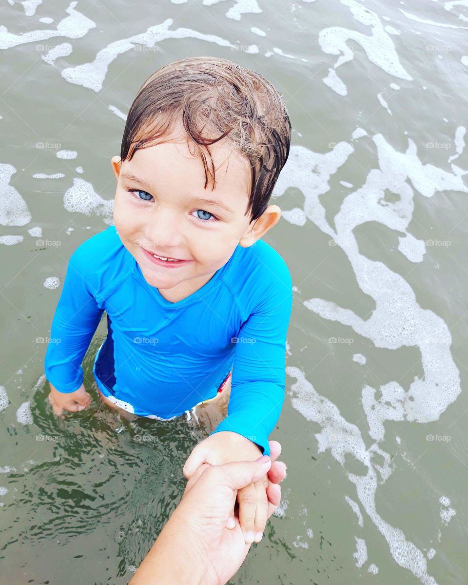 smiling beautiful child on the beach