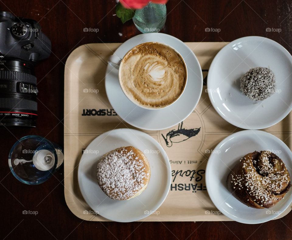 Tray with coffee and cakes