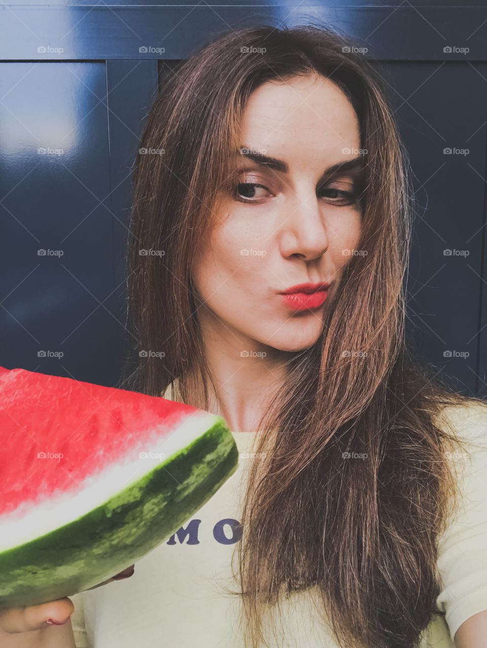 Summertime watermelon time. A girl with watermelon 