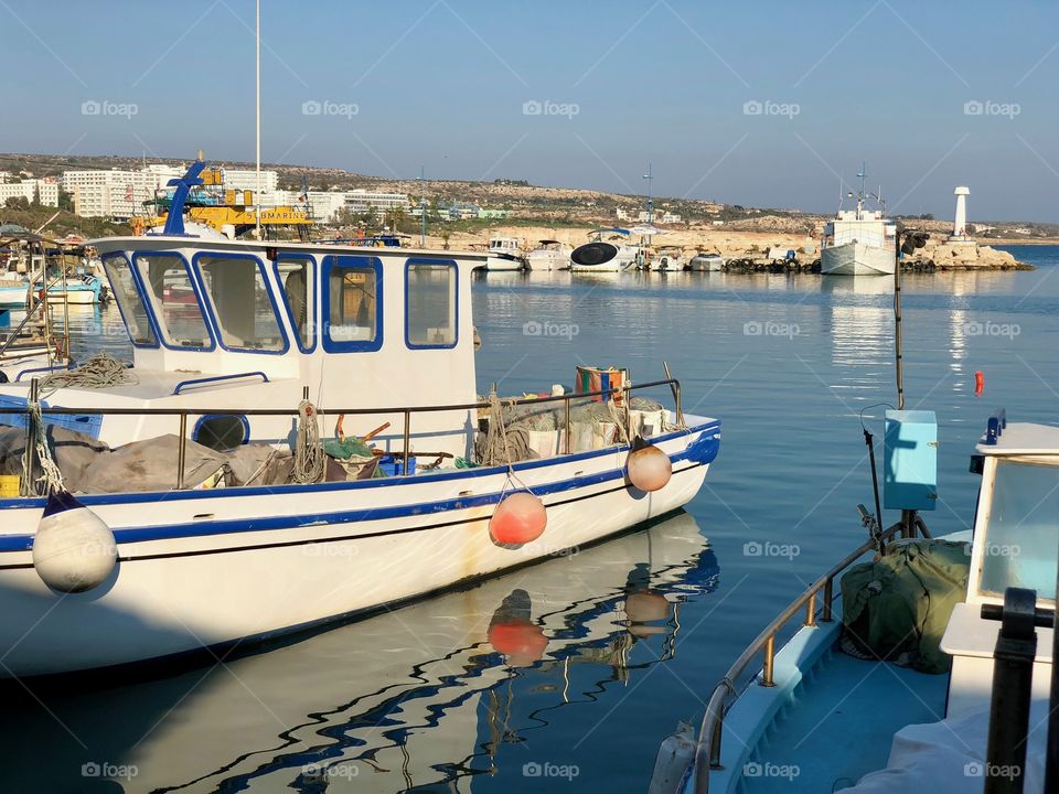 Fishing boats in the calm harbour 