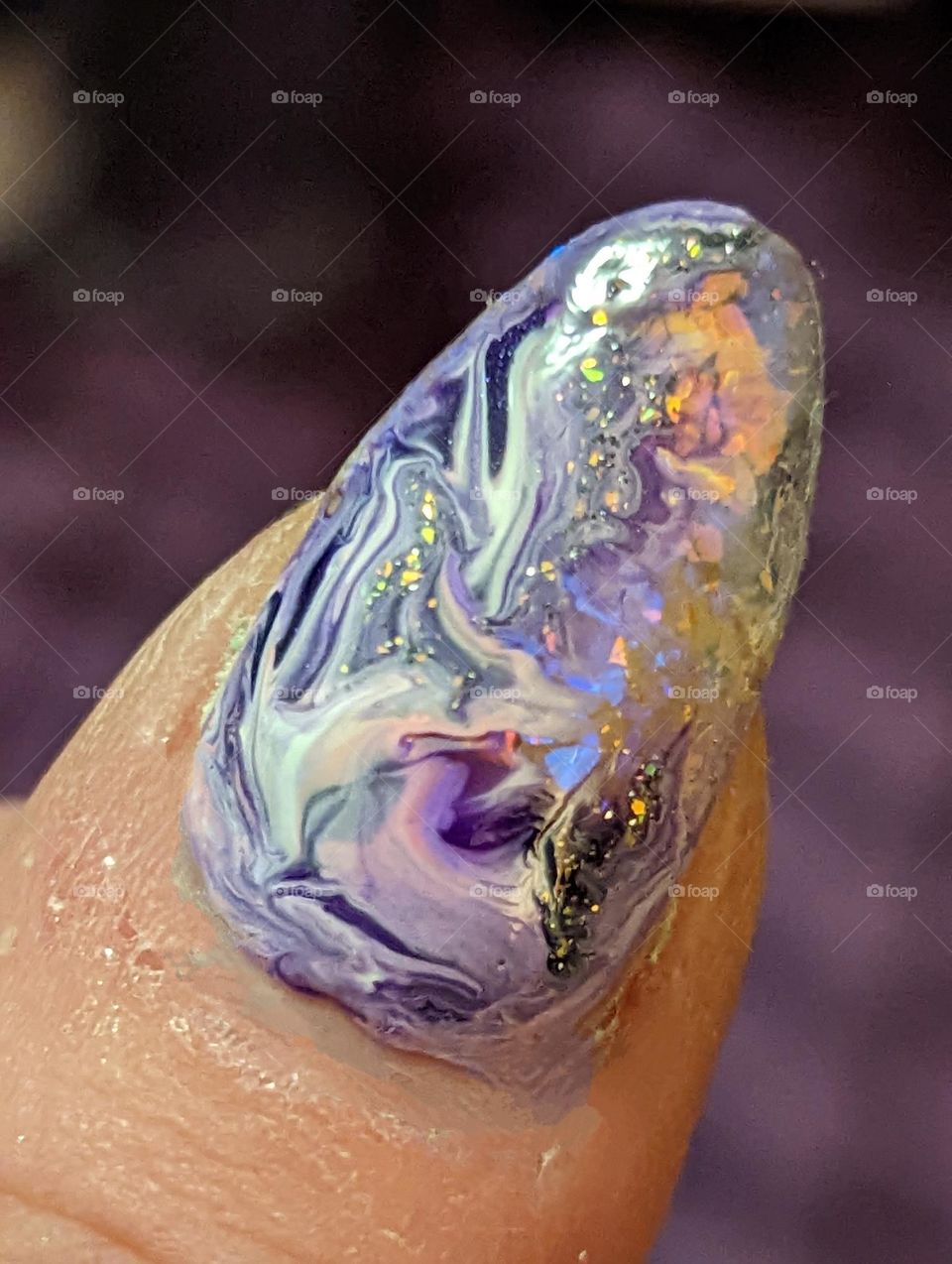 clear polygel with glitter flakes and marbled color