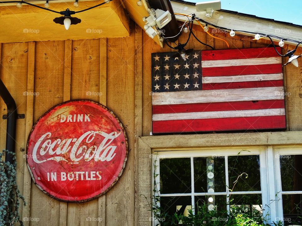 Vintage Coca Cola storefront sign 