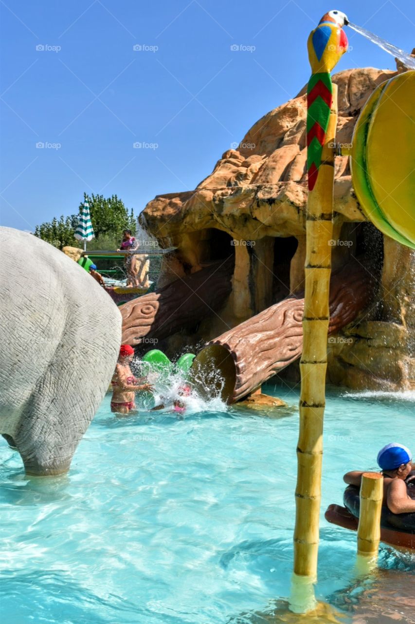 enjoying pool water