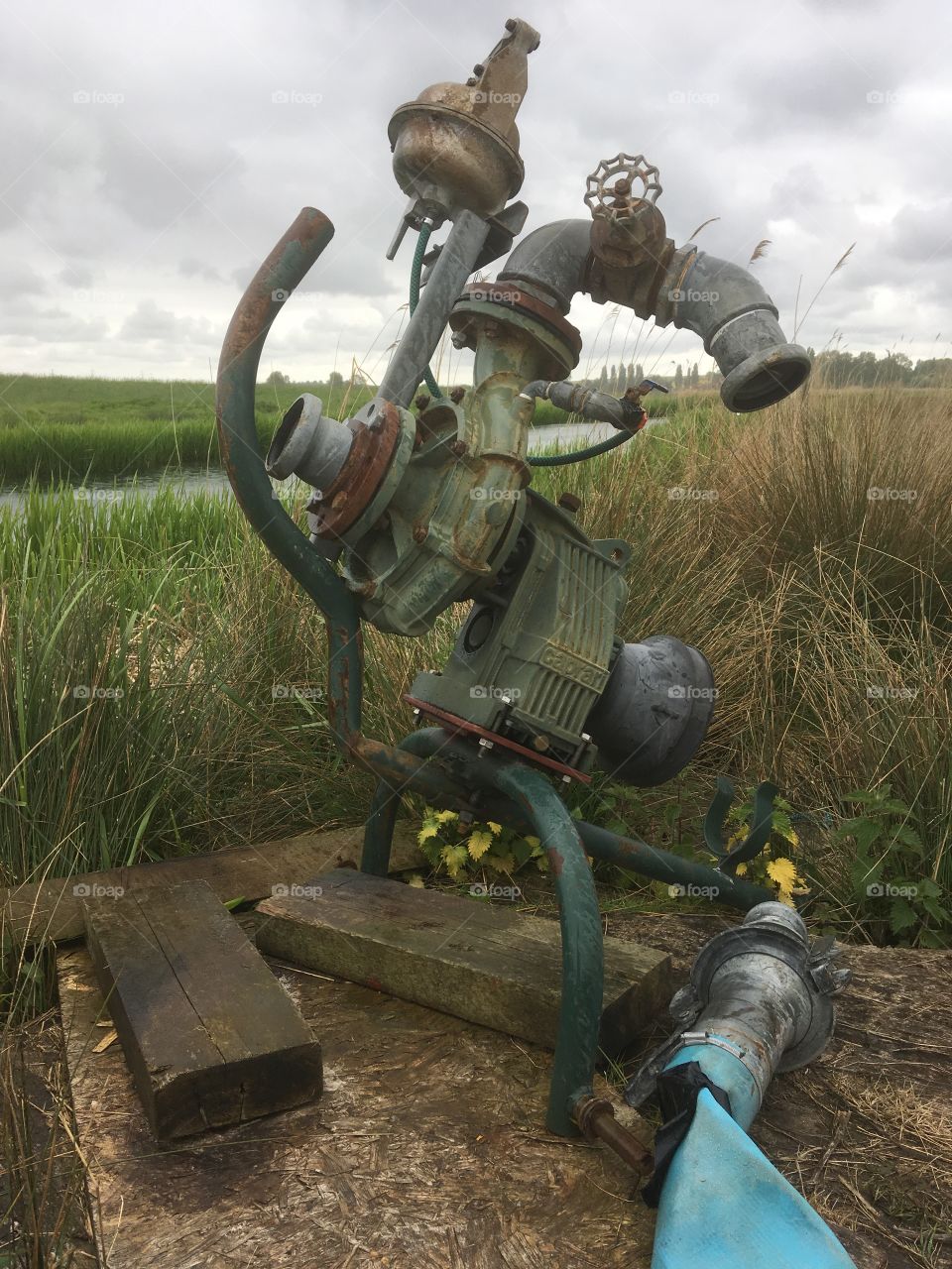 This is an extremely odd looking piece of kit, which pumps water into the marsh river , when it needs it. Could be modern art to the layman! beautiful marsh landscape behind 
