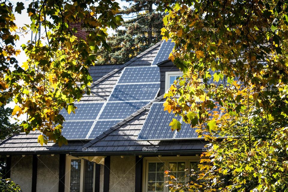 Solar panels on a roof of an old house