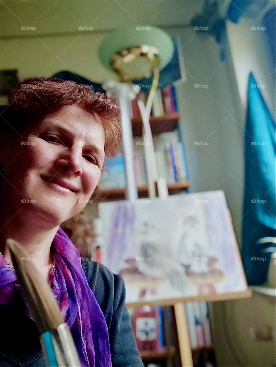 This lovely young lady who lives in “Bavaria”, Germany is the caretaker of two brother and sister cats named “Roukey” and “Linda” whom she has lovingly portrayed in the drawing displayed on the easel stand. 2024. Hypnotic Productions