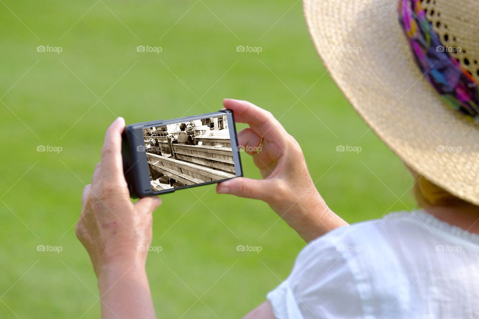 Phone. Camera phoneTourist taking a picture with a smartphone cell phone mobile phone camera 