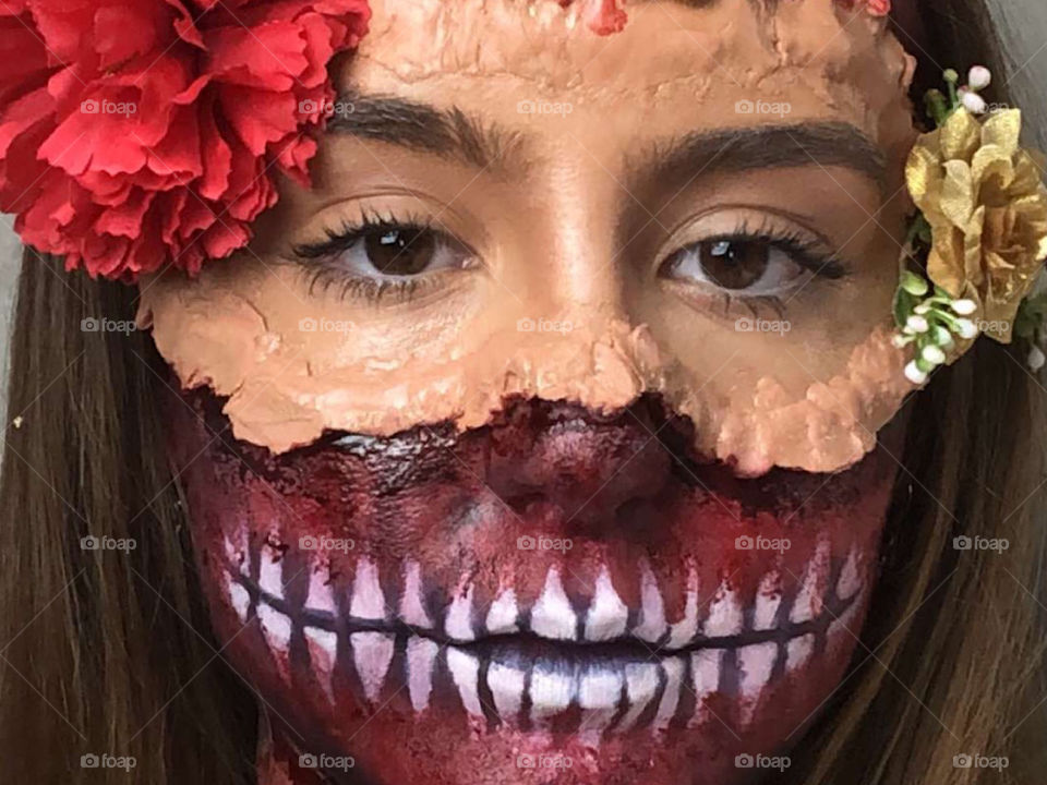 Dia de los Muertes style make-up for halloween on my sister, done by herself🤩