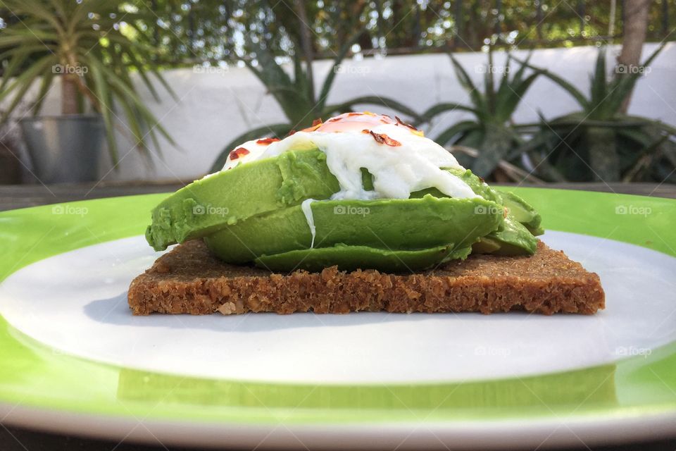 Healthy avocado and poached egg lunch