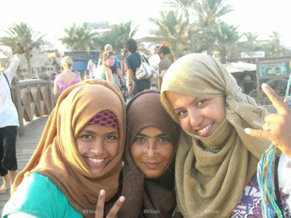 Three happy arabian girls