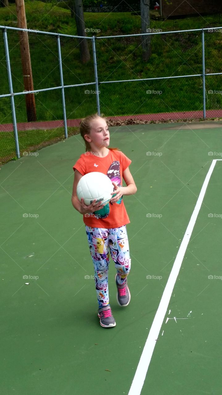 Girl playing with ball