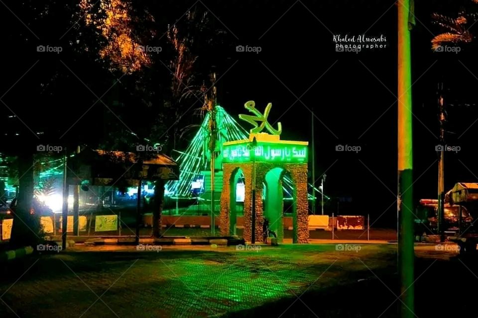 A very beautiful picture, and there is no better picture than it. There is no better picture of green herbs and colorful, red and white roses than it. Glory be to God, the natural and picturesque view, and there is no more