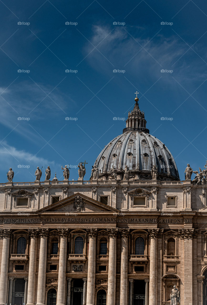 The dome of the Vatican City, on a bright sunny day.
