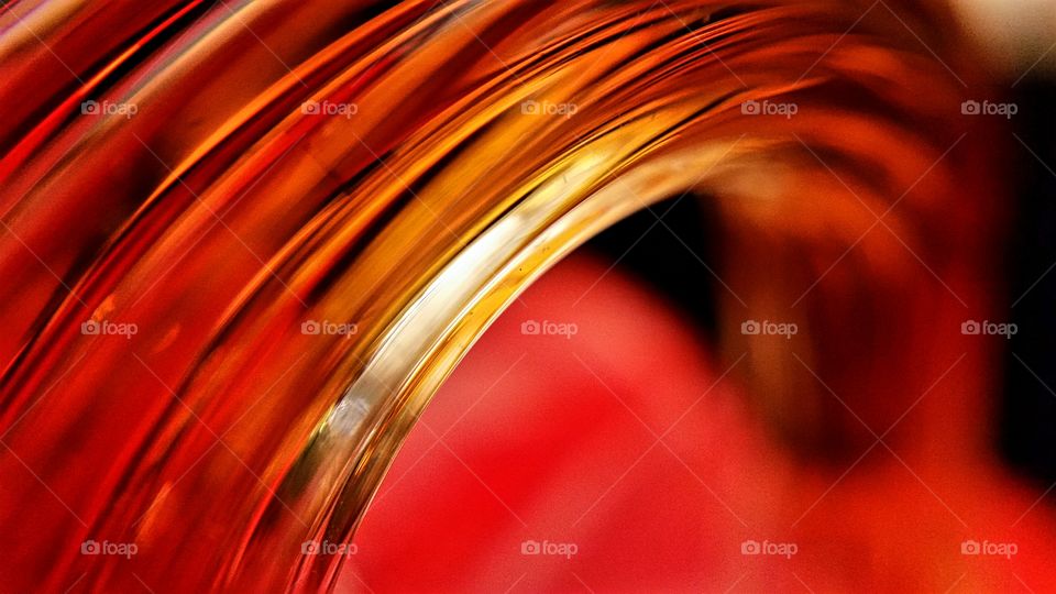 Macro shot of the curlicue stem on an art glass pumpkin!
