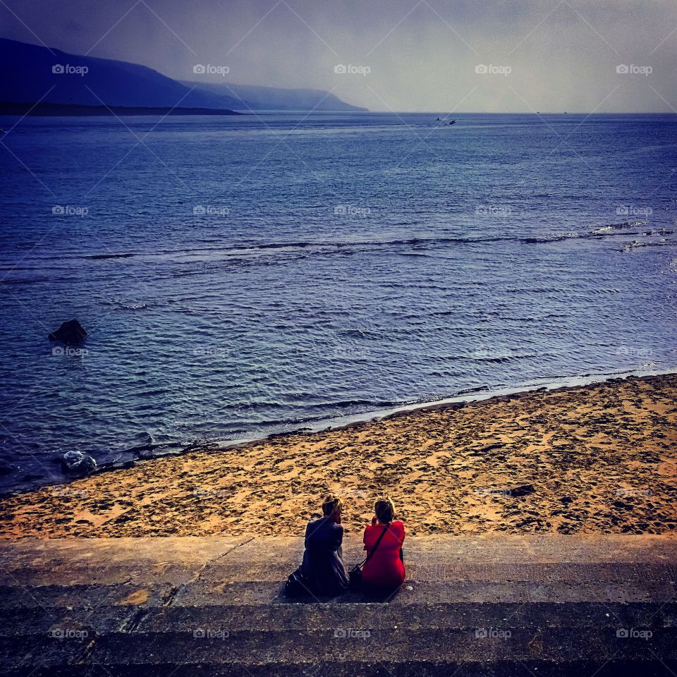 Seashore. Two women