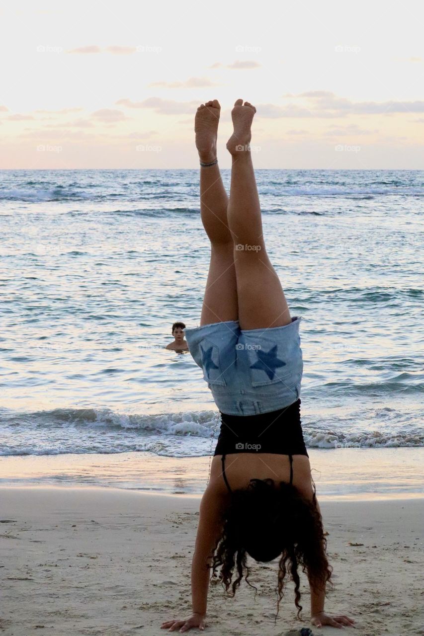 Handstand on the beach 