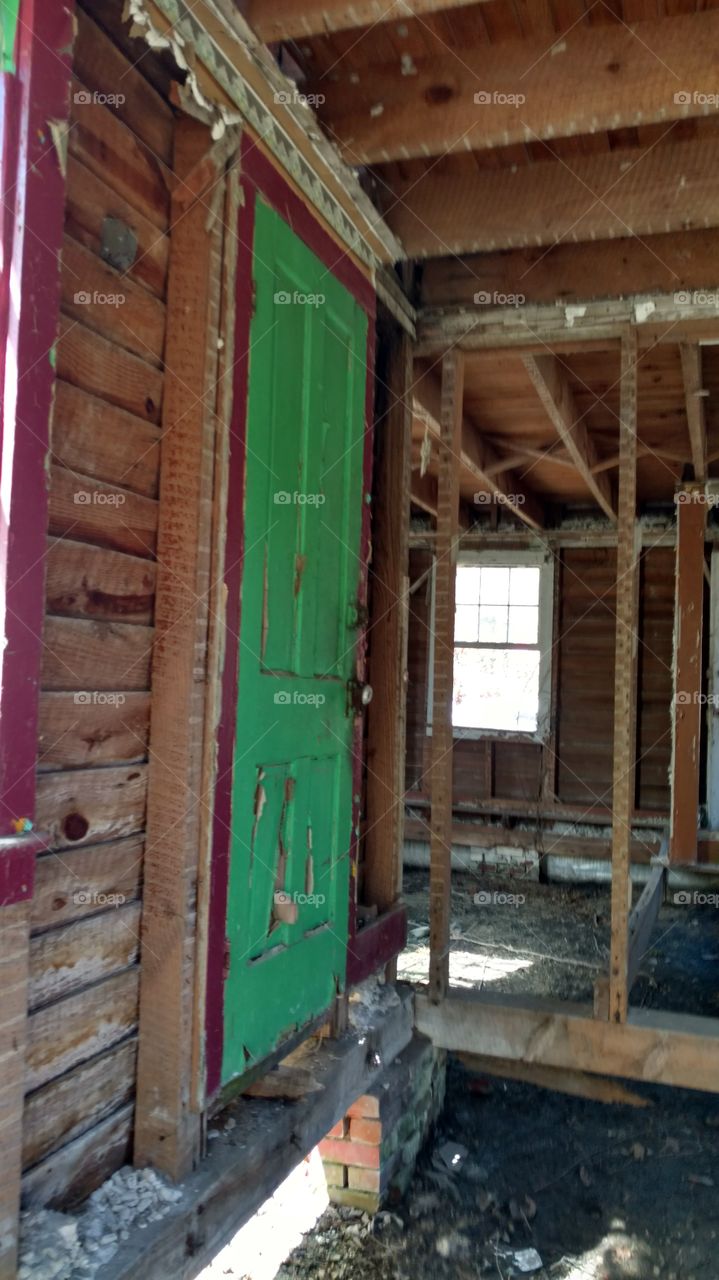 green door in abandoned house
