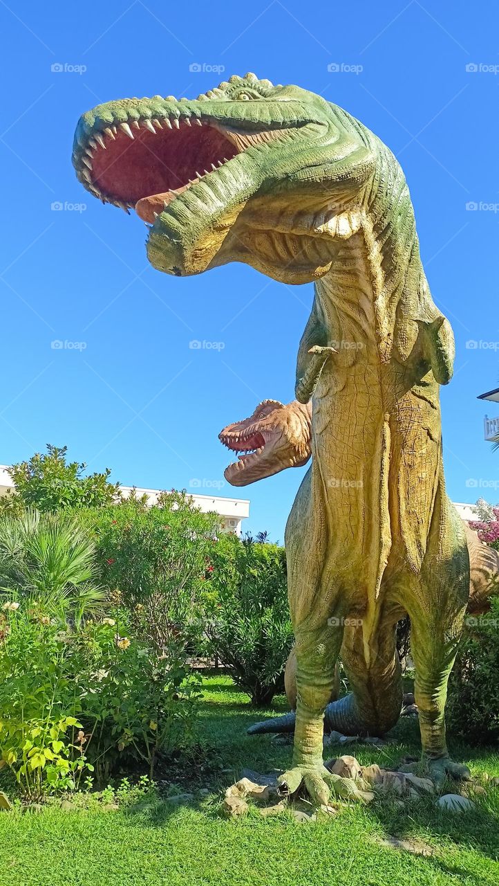 dinosaur family on a picnic, summer, sky, sun, dinosaur, statue, grass, flowers, lawn, beautiful weather