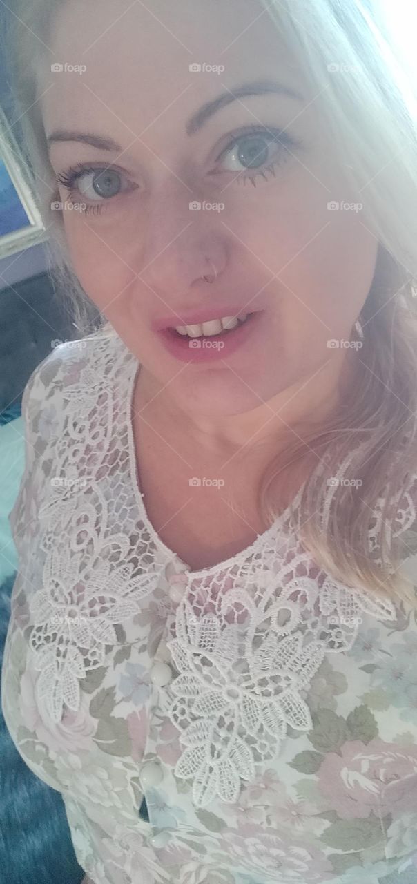 smiling girl with earrings