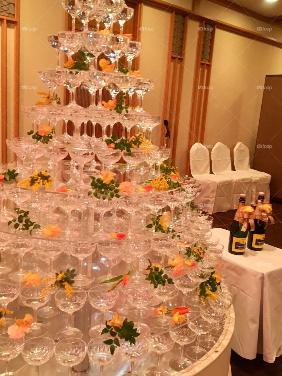 Gorgeous champagne tower at wedding reception 
