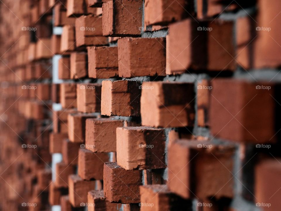 Close-up of raw bricks on wall