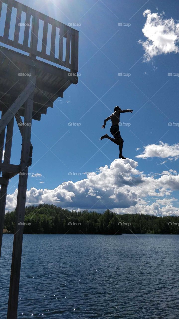 Jumping to a swimming pond and almost stepping on the clouds