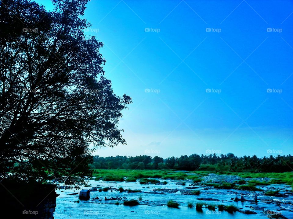 evening glow. a evening in front of river cau very