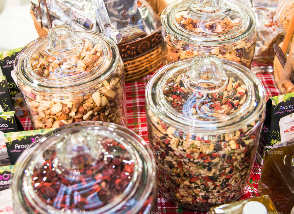 Mix Of Healthy Nuts In Glass Jars
