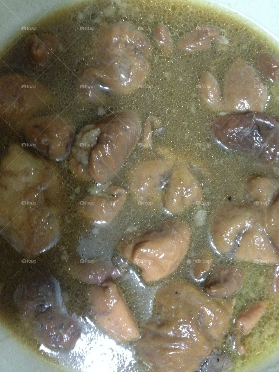 Pork intestine in thai herbal curry.