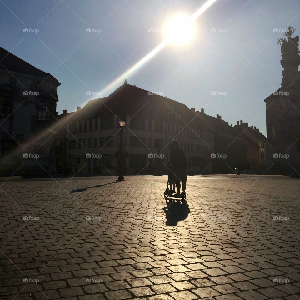 Reading a book not far from our hotel in Budapest I snapped this photo as the sun was setting .. proud of my sunbeam ☀️