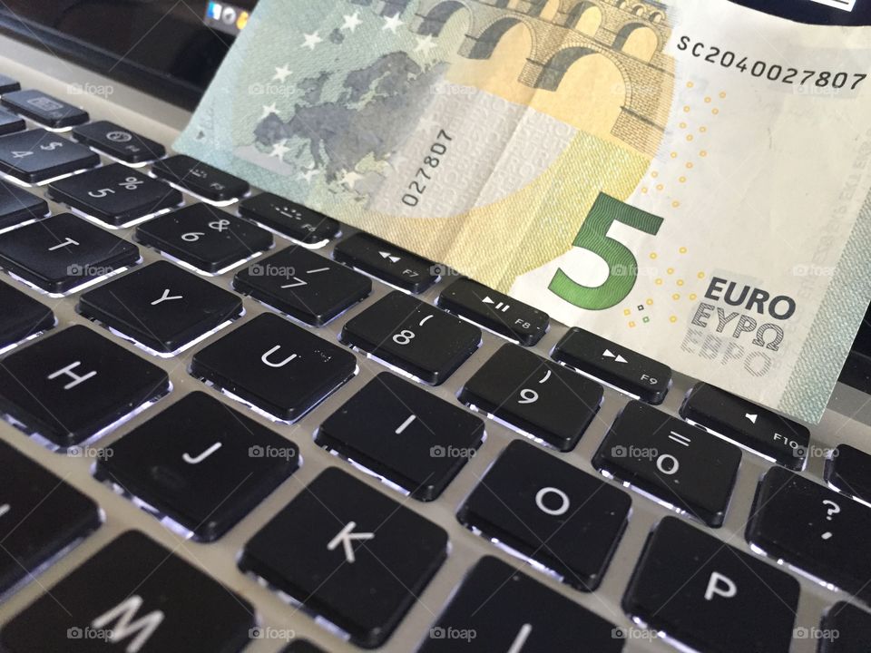 Computer keyboard and money 