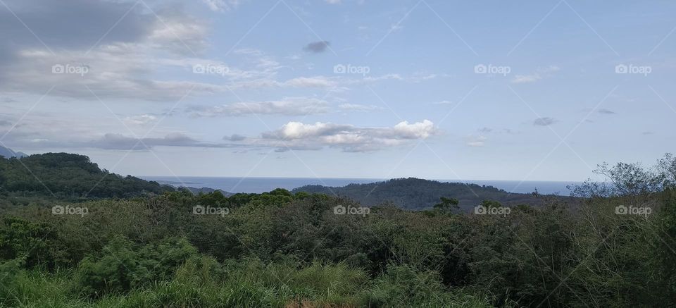 look at the mountains and the sea