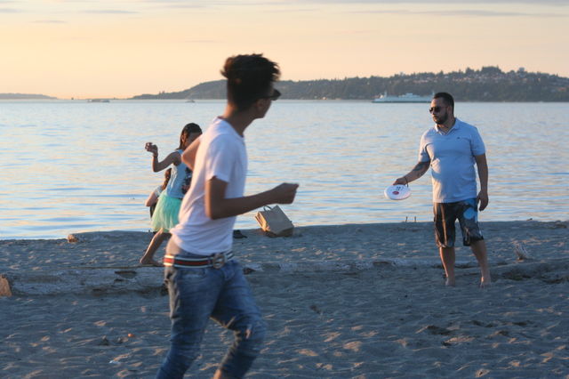 Hanging at the beach. Frisbee